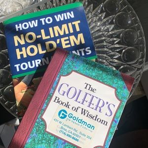 Two non-fiction paperbacks.  How to win Tournaments and Golfer’s Book of Wisdom
